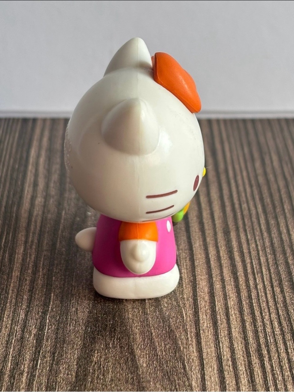 Sanrio Hello Kitty Pink Figure with Orange Bow and Yellow Taco Accessory - Picture 4 of 4
